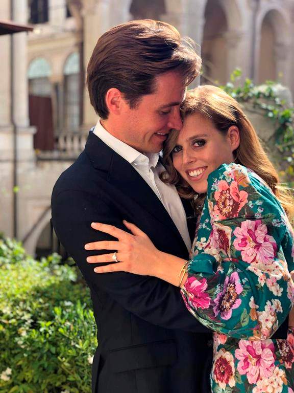 This undated photo released by Buckingham Palace shows Britain’s Princess Beatrice and Edoardo Mapelli Mozzi, in Italy. (Princess Eugenie/Buckingham Palace via AP)