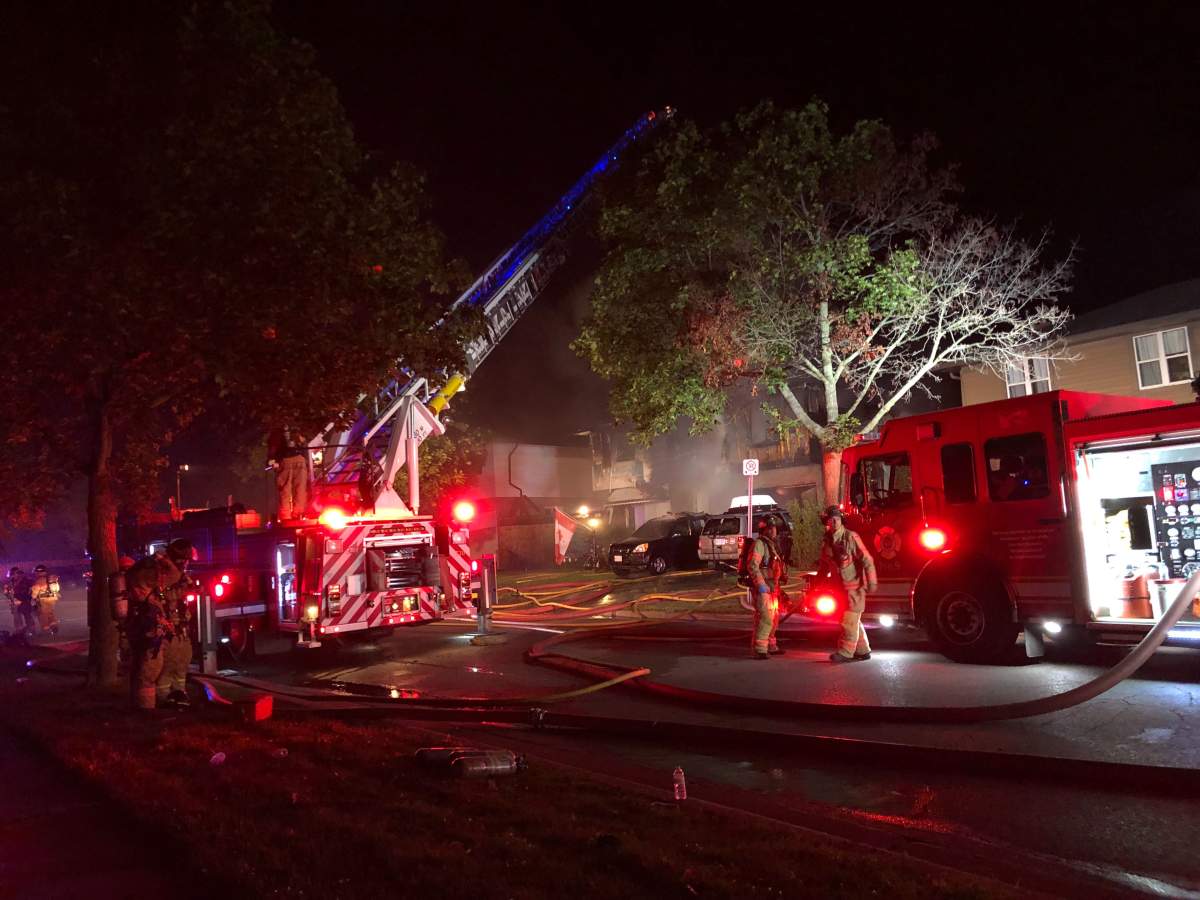 Fire crews battle a blaze along Millbank Drive in the early morning hours of Sept. 10, 2019.