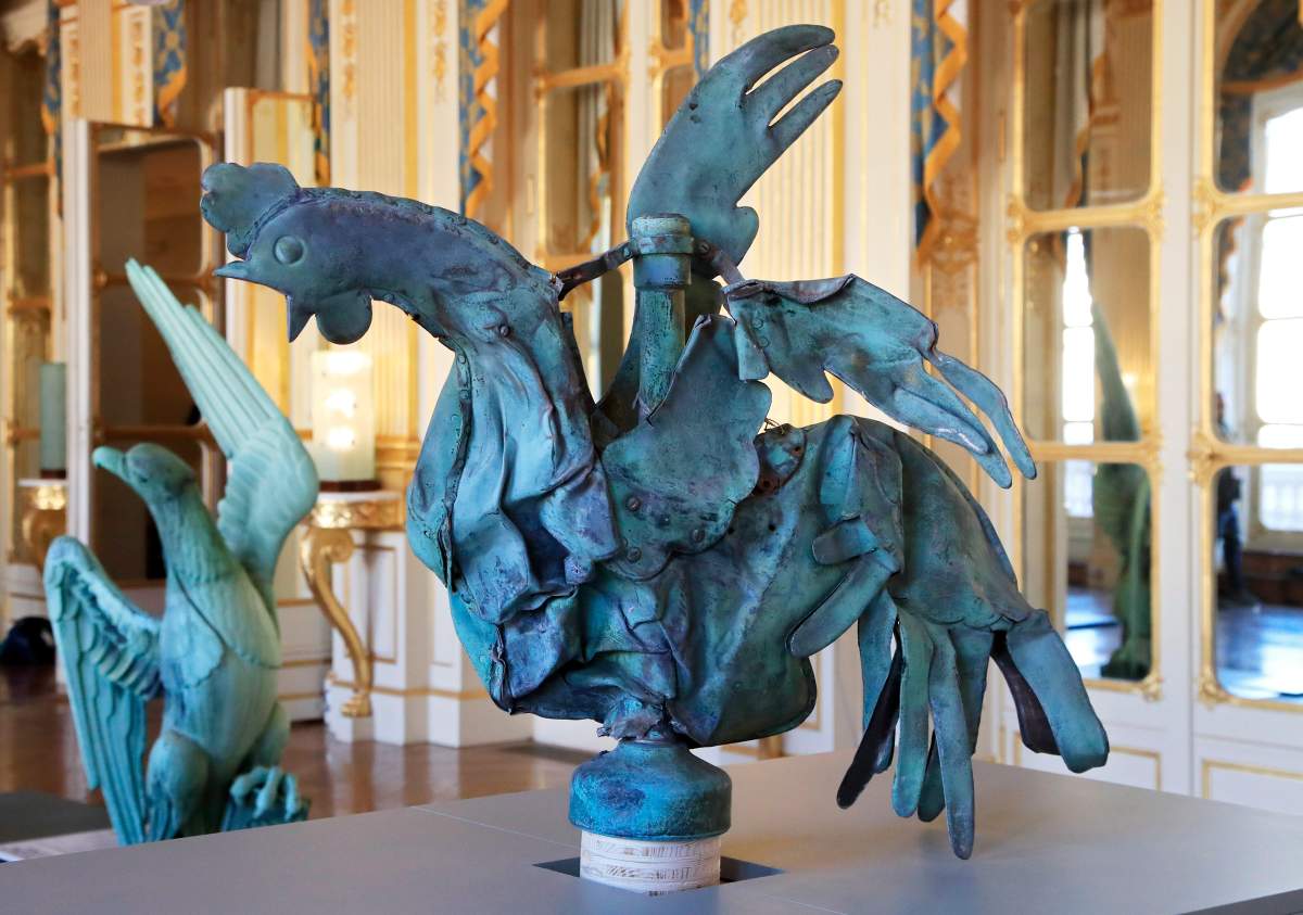 The rooster which plunged to the ground during the fire Notre Dame cathedral is displayed at the Culture Ministry in Paris, Friday, Sept. 20, 2019. The rooster, long a symbol of France, tumbled to the ground in the April blaze that consumed the cathedral’s roof and collapsed its spire. The bird somehow survived, and is going on public display this weekend.