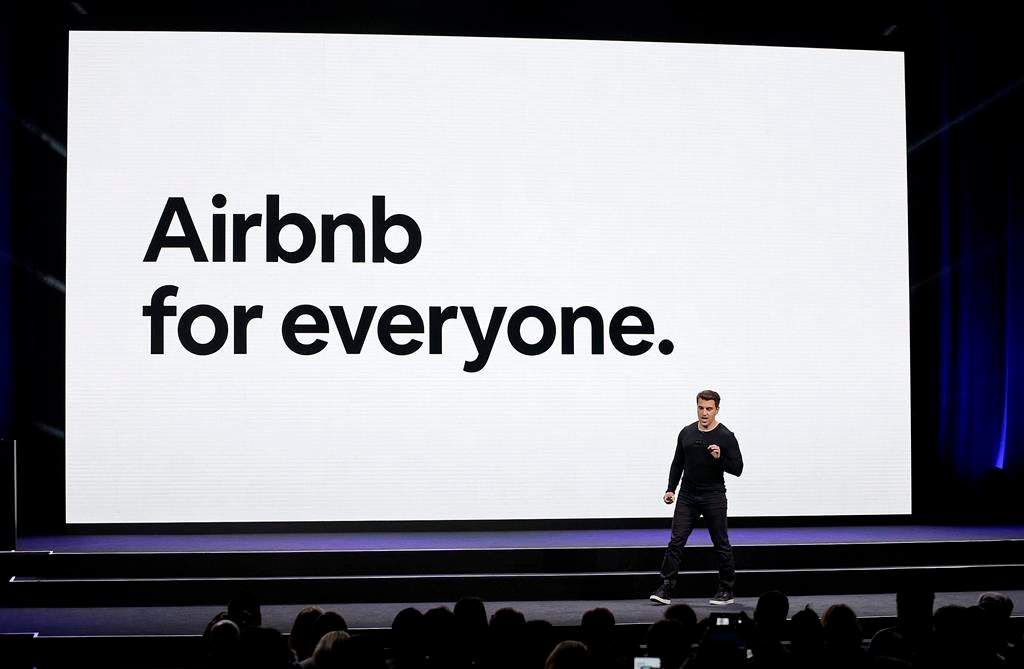 FILE - In this Feb. 22, 2018, file photo, Airbnb co-founder and CEO Brian Chesky speaks during an event in San Francisco.
