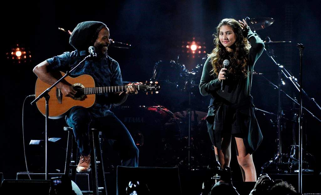 This Jan. 16, 2019 file photo shows Toni Cornell, right, daughter of the late singer Chris Cornell, performing with Ziggy Marley during ‘I Am The Highway: A Tribute to Chris Cornell’ in Inglewood, Calif.