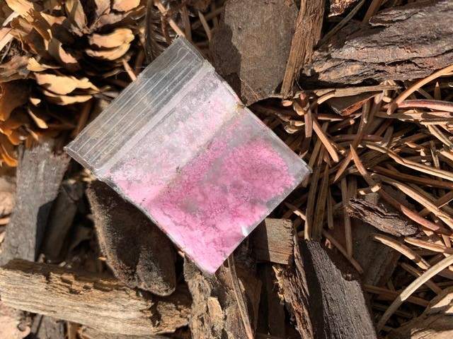 A bag of unknown pink powder Strandquist found in Olympic Plaza.