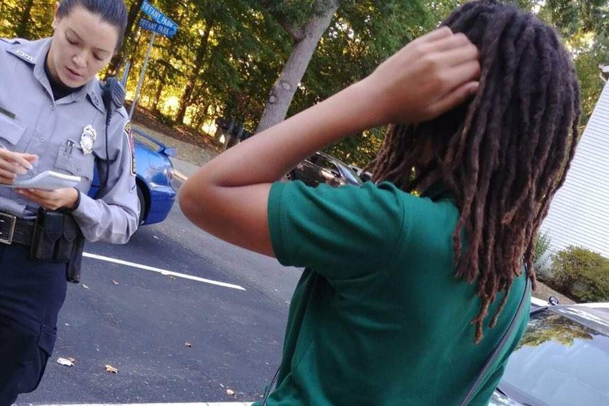 A girl describes an alleged attempt to cut her dreadlocks at Immanuel Christian School in Springfield, Va., on Sept. 26, 2019.