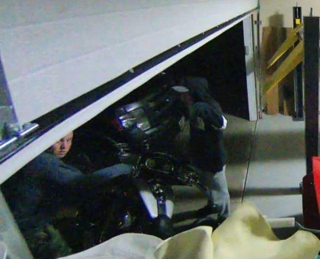 Police are looking for the two men caught on camera.