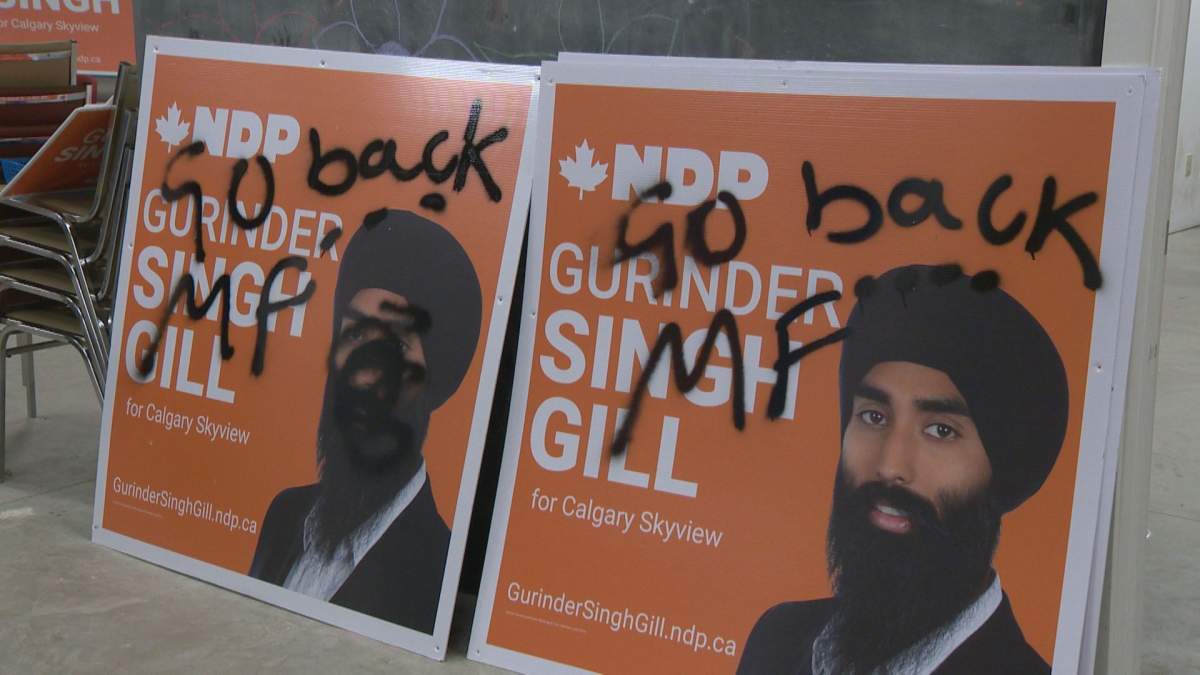Racist slurs are spray-painted on federal election signs for Calgary Skyview NDP candidate Gurinder Singh Gill.