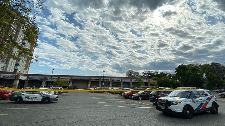 A plaza parking lot near the school was cordoned off by police.