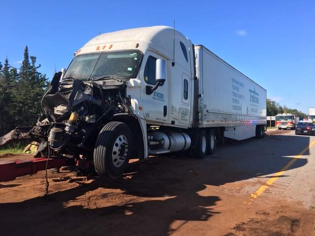 The front end of one of the trucks was completely destroyed in the collision.