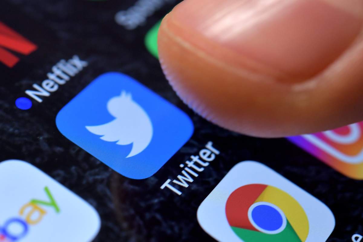 A close-up image showing the Twitter app on an iPhone in Kaarst, Germany, Nov. 8 2017. Canada's top civil servant is sending a stern warning to government workers as part of his election campaign guidelines, reminding them to be extra careful about what they say on social media.