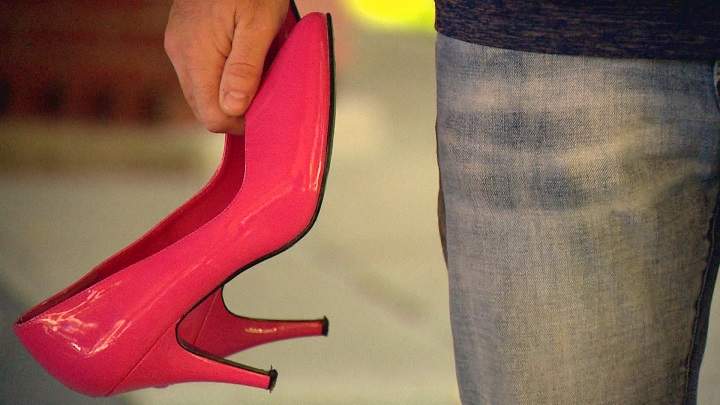 Men and women strapped on the pumps Friday to raise money and awareness for programs that support women fleeing from domestic or sexual abuse.