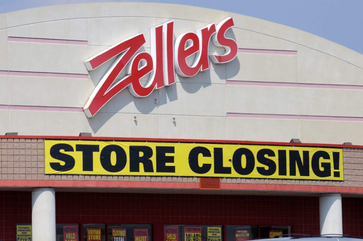 A Zellers store with a "store closing" sign.