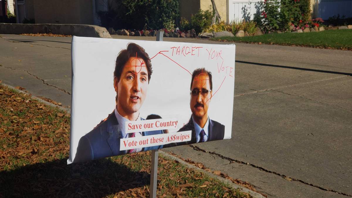 A sign on a lawn in southeast Edmonton shows Liberal leader Justin Trudeau and Edmonton Mill Woods candidate Amarjeet Sohi with crosshair targets on the foreheads. Thursday, October 3, 2019