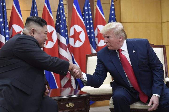 In this June 30, 2019, file photo, U.S. President Donald Trump, right, meets with North Korean leader Kim Jong Un at the border village of Panmunjom in the Demilitarized Zone, South Korea.