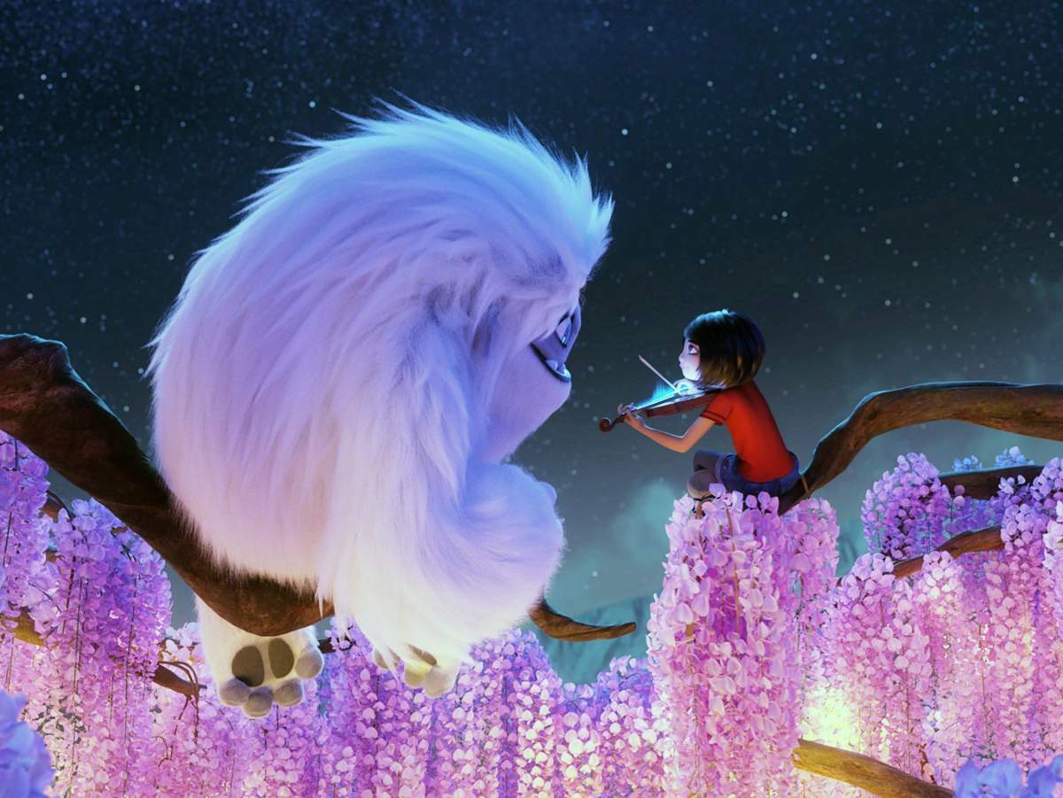 Everest (voice: Joseph Izzo) and Yi (voice: Chloe Bennet) from 'Abominable.'.