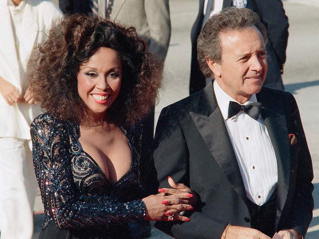 This Sept. 21, 1986 file photo shows singers Vic Damone, right, and Diahann Carroll at the Emmy awards in Los Angeles. Carroll died, Friday, Oct. 4, 2019, at her home in Los Angeles after a long bout with cancer. She was 84.