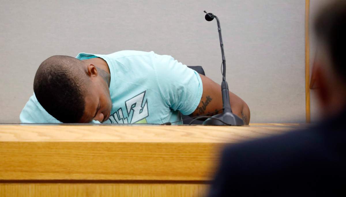 FILE – In this Tuesday, Sept. 24, 2019, file photo, Joshua Brown, a neighbor of victim Botham Jean, is overcome with emotion while giving testimony in court, in Dallas, after recounting how he’d heard Jean singing gospel and Drake songs across the hall before he was fatally shot. Authorities say that Brown was killed in a shooting Friday, Oct. 4.