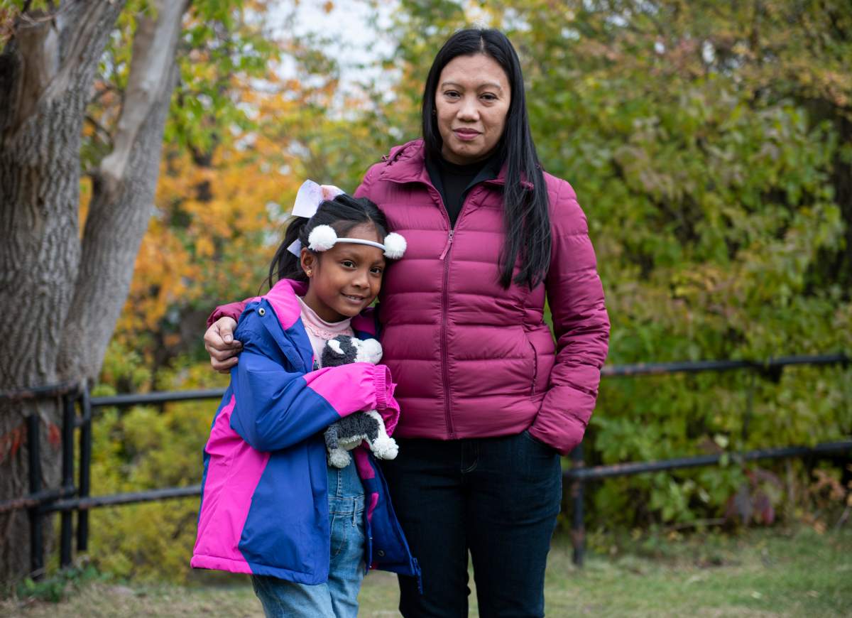 Vanessa Mae Rodel and her daughter Keana Kellapatha, 7, are seen after a press conference on the status of the "Snowden Refugees", Keana's father and siblings that remain in Hong Kong, in Ottawa, on Wednesday, Oct. 16, 2019. 