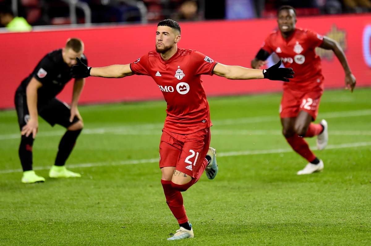 Toronto FC midfielder Jonathan Osorio (21) celebrates his second goal of the night during extra time MLS playoff soccer action against the D.C. United, in Toronto on Saturday, Oct. 19, 2019.
