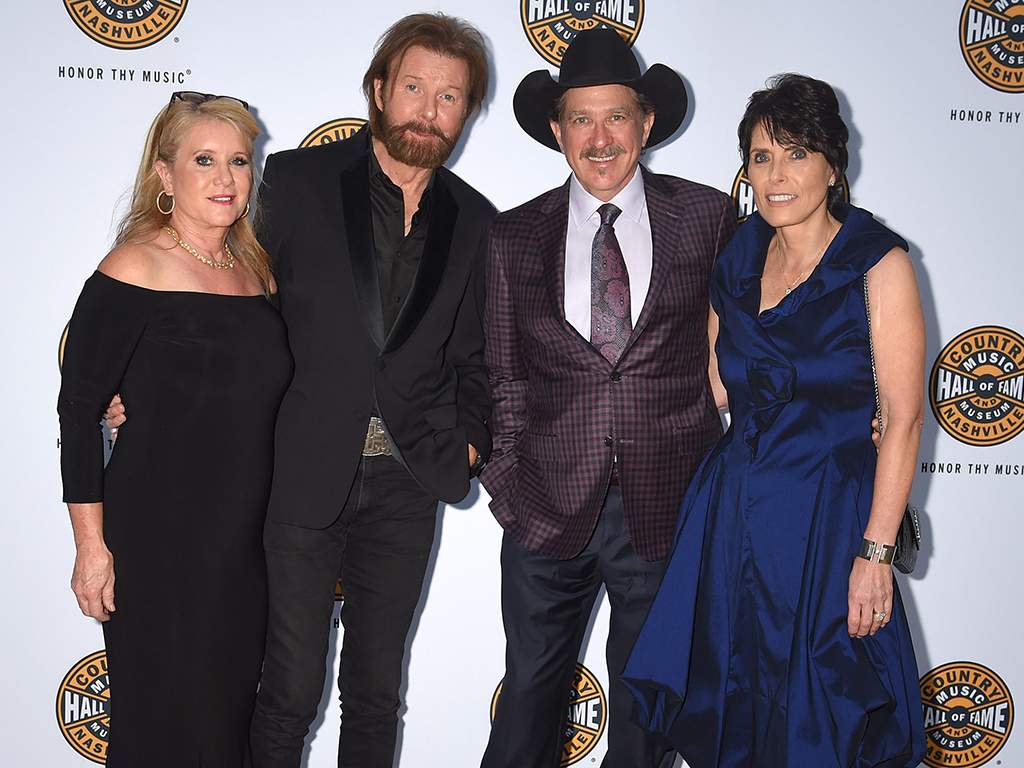 (L-R) Janine Dunn, Ronnie Dunn, Kix Brooks and Barbara Brooks at the 2019 Country Music Hall of Fame Medallion Ceremony held at the Country Music Hall of Fame & Museum on Oct. 20, 2019 in Nashville, Tenn.