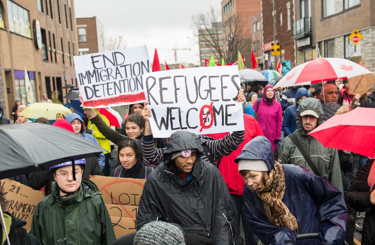 People attend a demonstration opposing Quebec’s Law 21 in Montreal, Sunday, Oct. 27, 2019.
