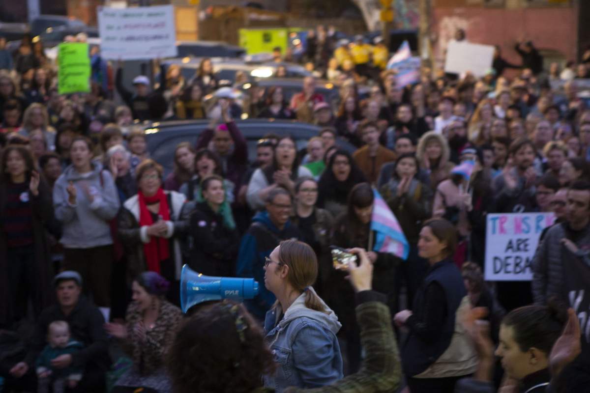 Trans writer and activist Gwen Benaway speaks to the crowd gathered outside a Toronto Library before writer Meghan Murphy spoke at an event on Tuesday, October 29, 2019.