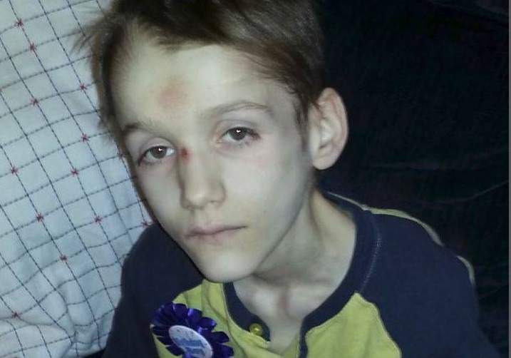 This court exhibit photo shows Alex Radita celebrating his 15th birthday, just months before he died.