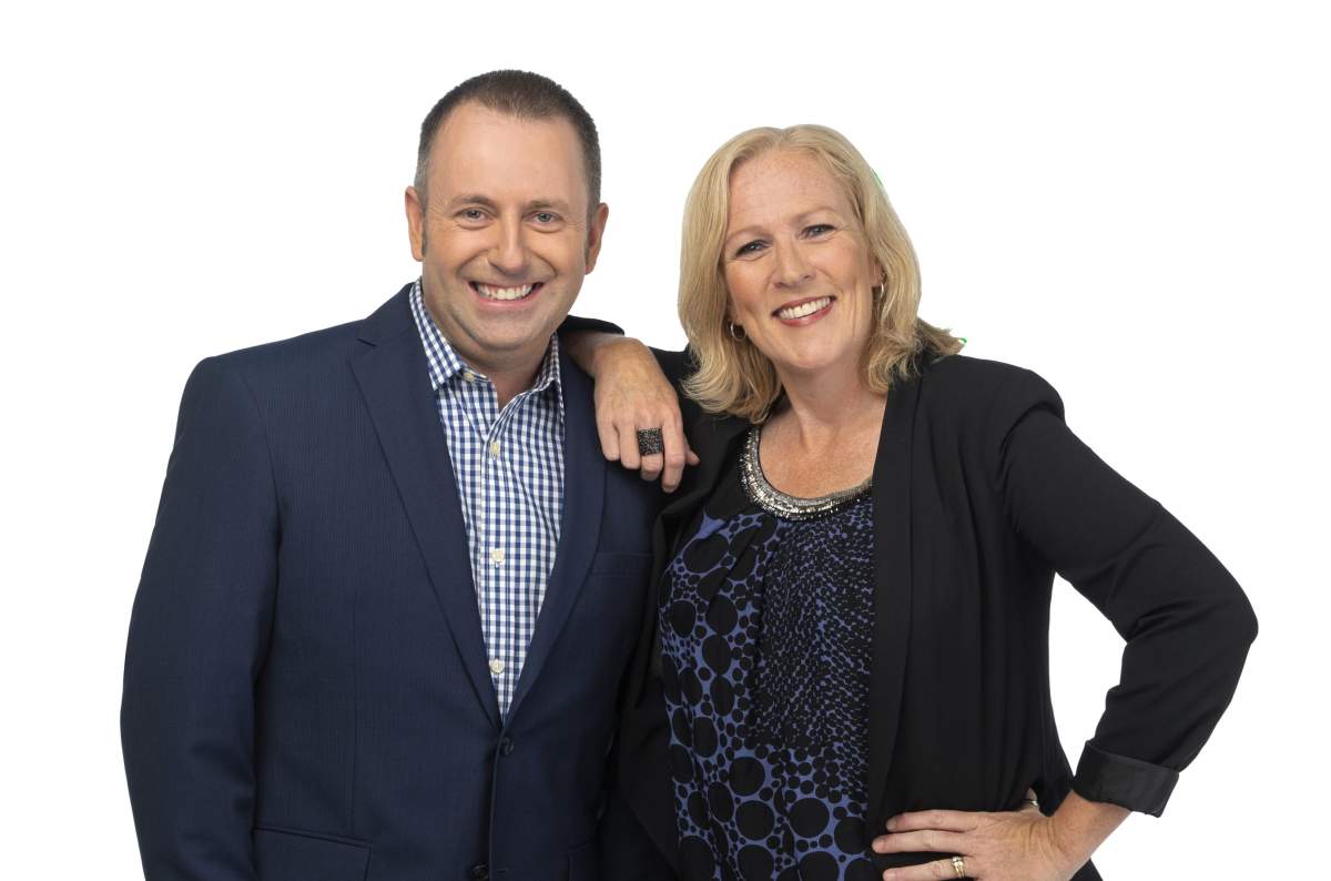 Sue Deyell poses in a photo with her new co-host Andrew Schultz.