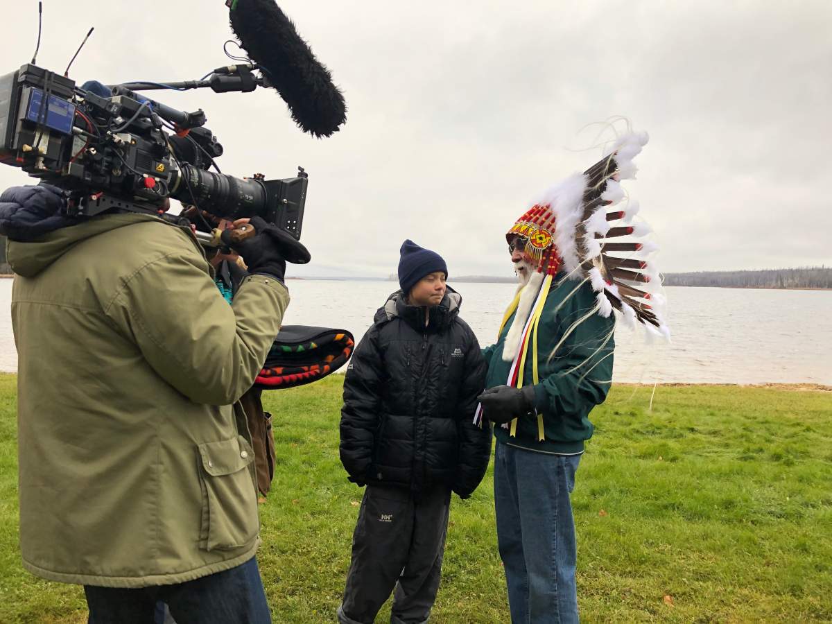A crew from the BBC films Greta Thunberg with Chief Archie Waquan of Mikisew Cree First Nation on Saturday, Oct. 19, 2019.