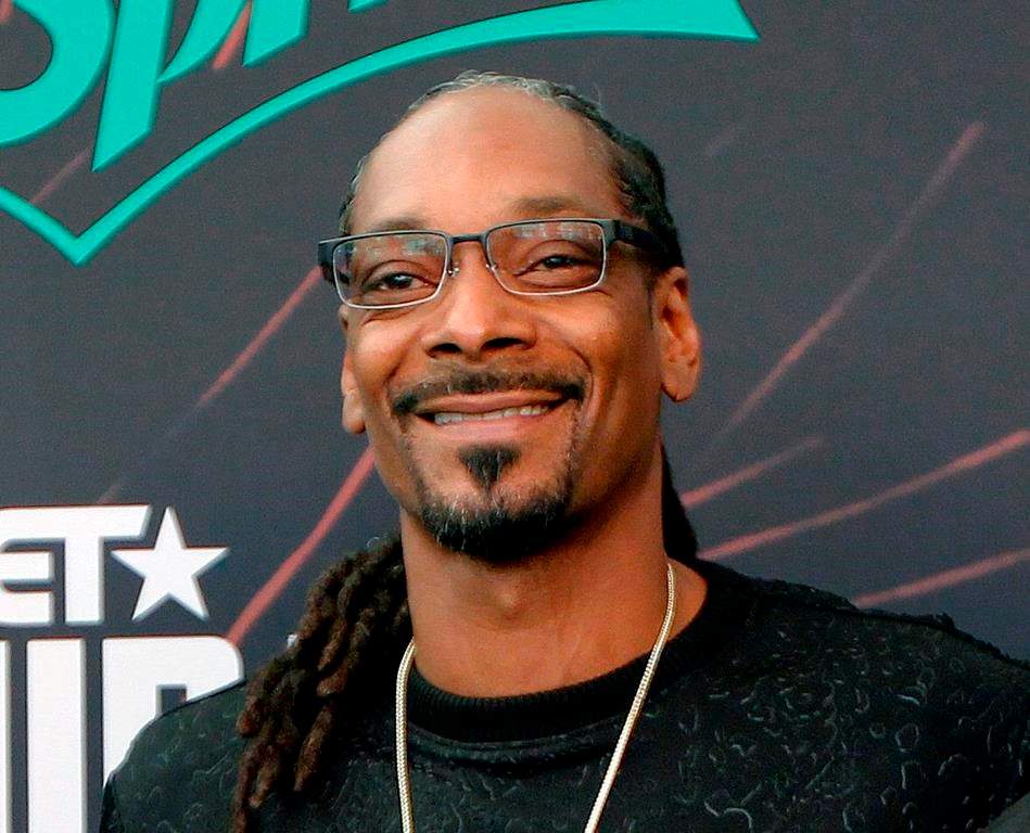 In this Sept. 17, 2016 file photo, Snoop Dog smiles at the BET Hip Hop Awards in Atlanta, Ga.