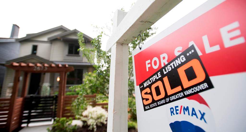 A real estate sign is pictured in Vancouver, B.C., on June, 12, 2018.