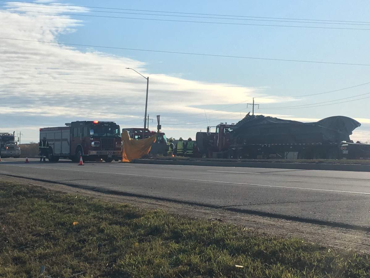 Officials at the scene say at least one person was killed in the crash.