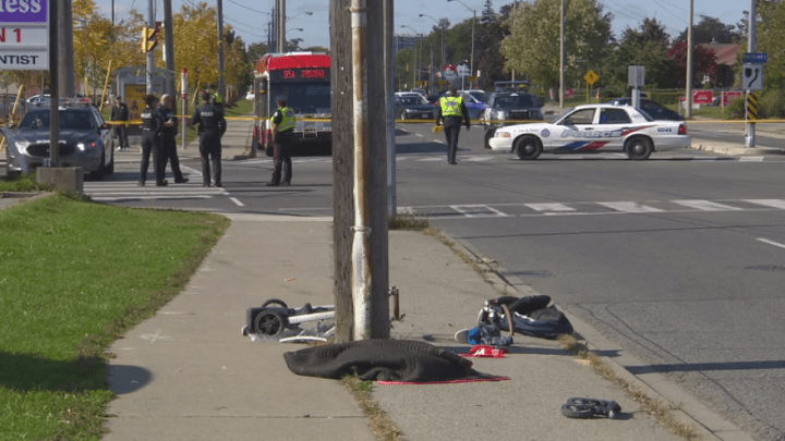 Investigators at the scene of the collision on Sunday.