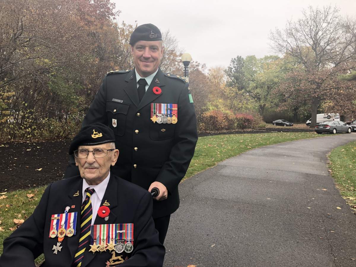 Canadian WWII veteran Don White, 95, attended a planting ceremony for special orange tulips to mark the 75th anniversary of the liberation of the Netherlands. White, pictured with Lt. Andrew Fenton, was a member of the Royal Canadian Dragoons, who liberated the Dutch town of Leeuwarden.