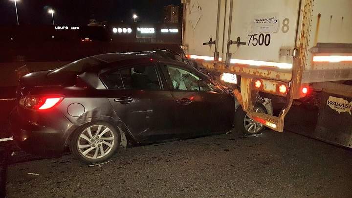 OPP say a man in his 30s remains in critical condition after his vehicle crashed into a transport truck on Highway 401. 