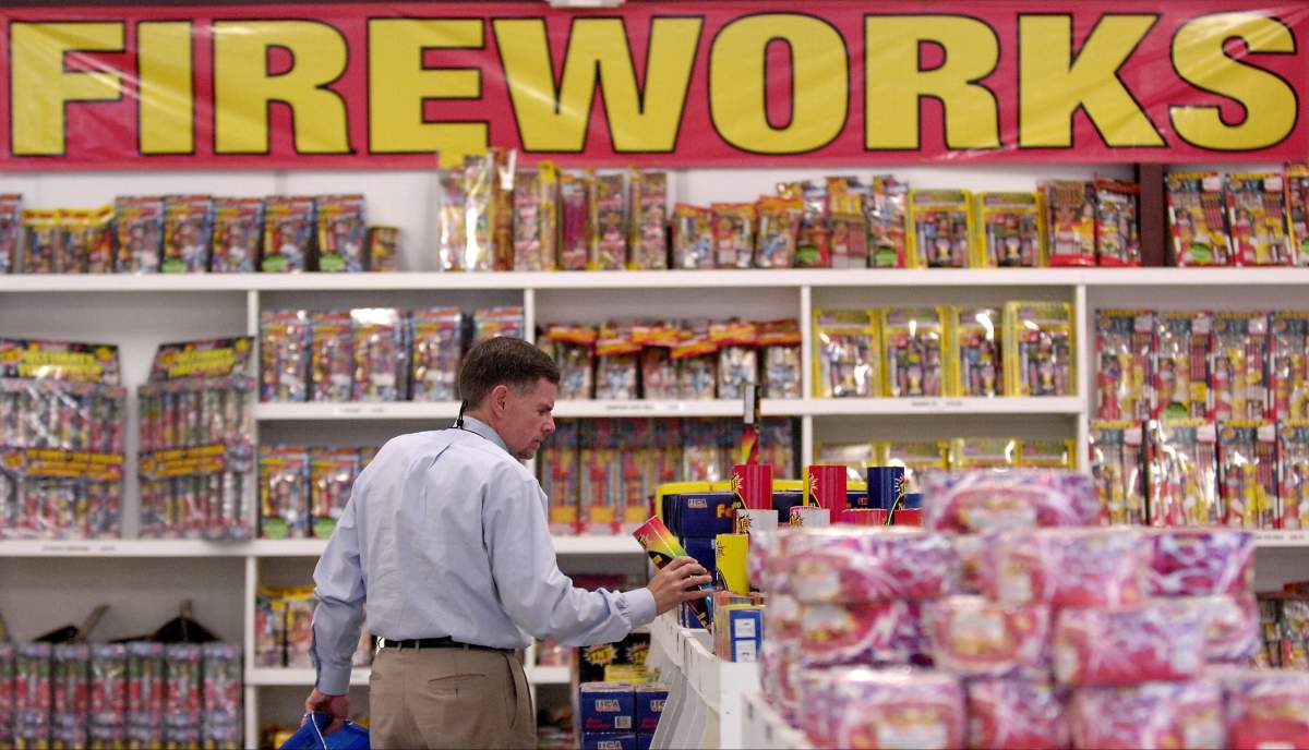 Henry Carrouth of Graham, N.C., shops for fireworks at the Fireworks Giant store near Interstate-20 in North Augusta, S.C., on Monday, June 25, 2007. 