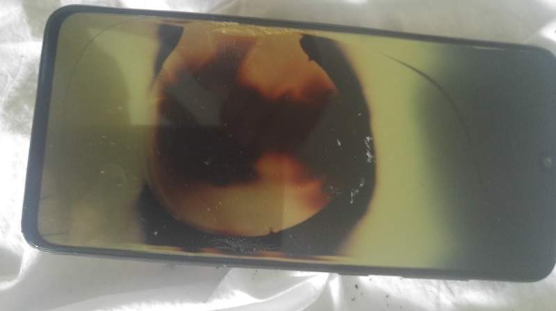 The front of Ethan Ahlin’s damaged cellphone.