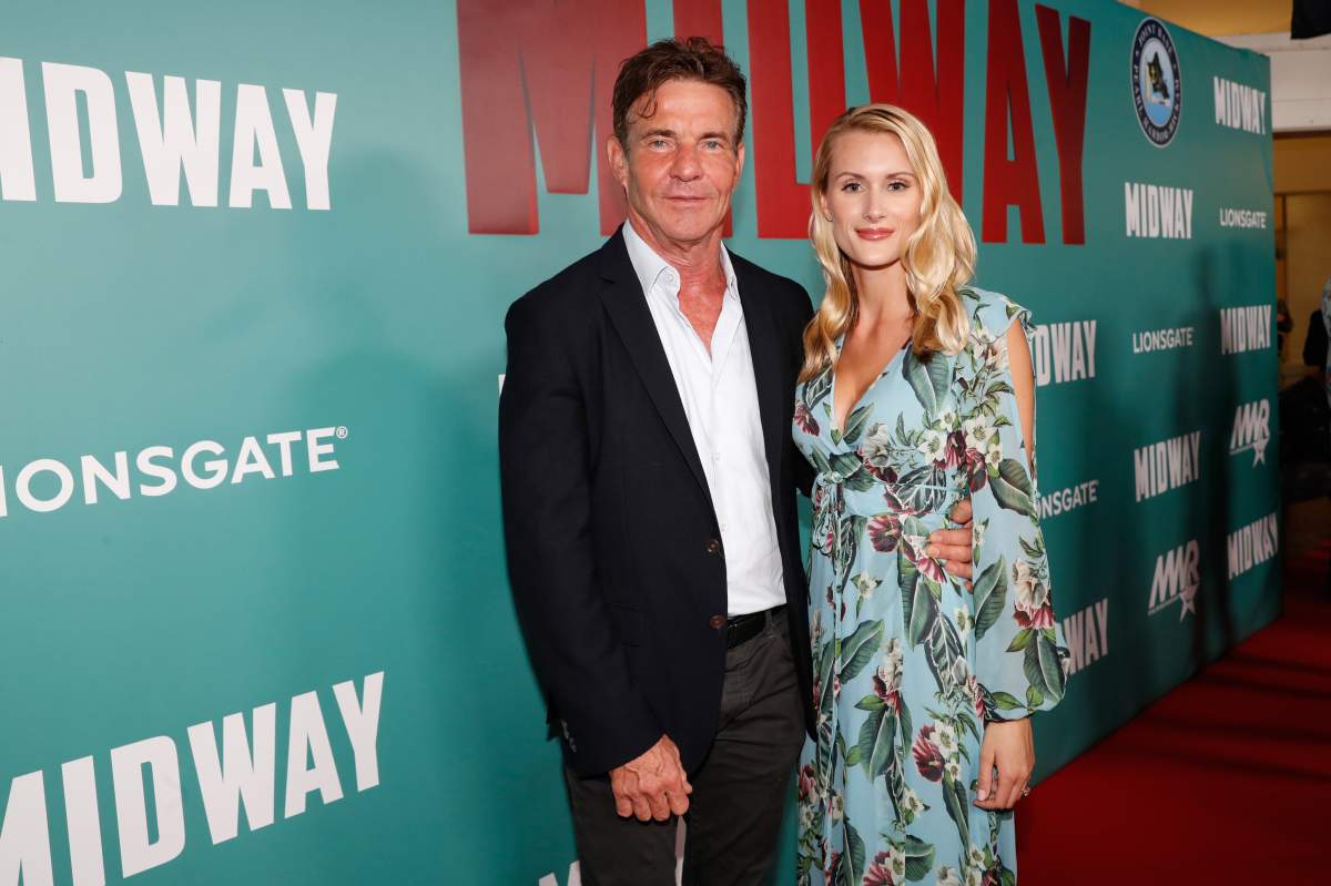 (L-R) Dennis Quaid and fiancee Laura Savoie arrive at the 'Midway' Special Screening at Joint Base Pearl Harbor-Hickam on October 20, 2019 in Honolulu, Hawaii. 