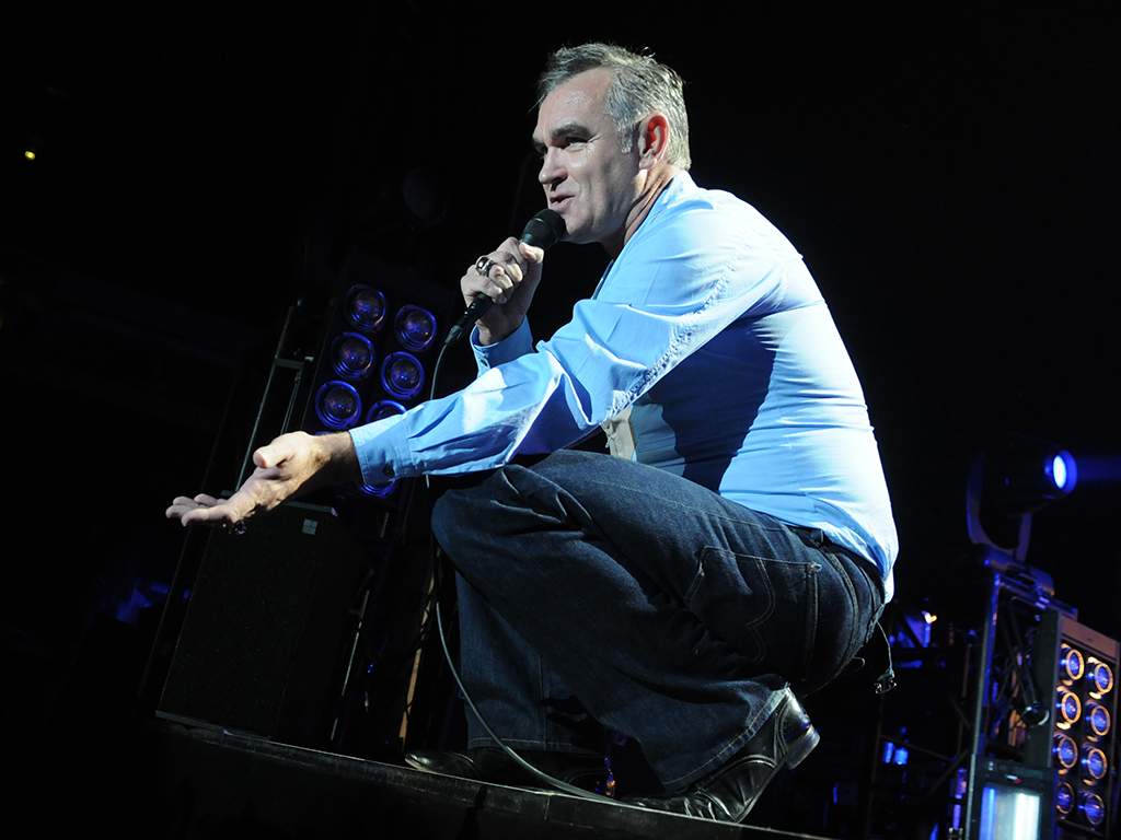 Morrissey performs on stage at Manchester Arena on July 28, 2012 in Manchester, United Kingdom.