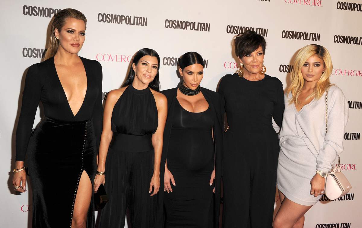 Khloe, Kourtney and Kim Kardashian pose with Kris and Kylie Jenner as they arrive at the Cosmopolitan Magazine's 50th Birthday Celebration at Ysabel on Oct. 12, 2015 in West Hollywood, Calif.