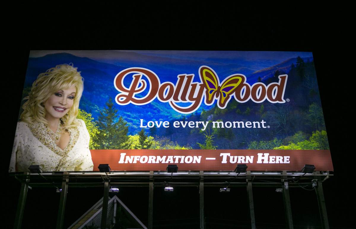 A billboard on The Parkway promotes Dolly Parton’s Dollywood as viewed on October 18, 2016 in Pigeon Forge, Tennessee. (Photo by George Rose/Getty Images)