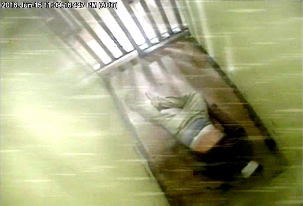 Corey Rogers, 41, lies in a police lockup cell at about 11 p.m. on June 15, 2016, where he later died, in this still image taken from surveillance video provided by Nova Scotia Courts. THE CANADIAN PRESS/HO, Province of Nova Scotia Courts *MANDATORY CREDIT*