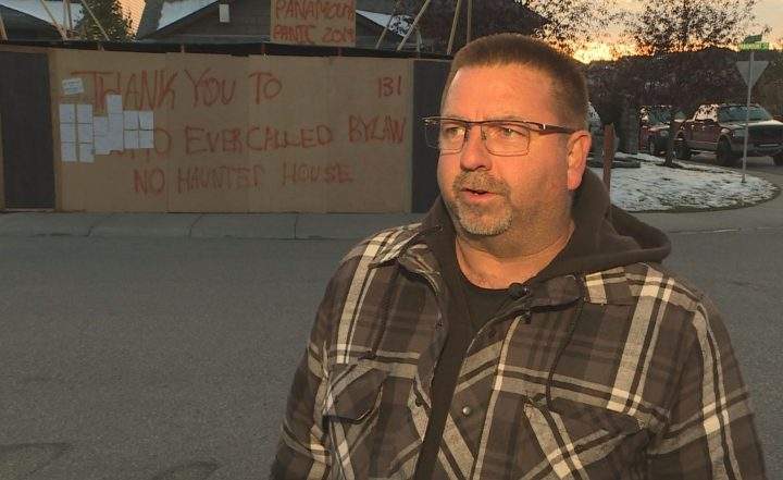 Ron Motteram’s haunted house is allowed to stay up if he makes some structural changes, according to the City of Calgary.