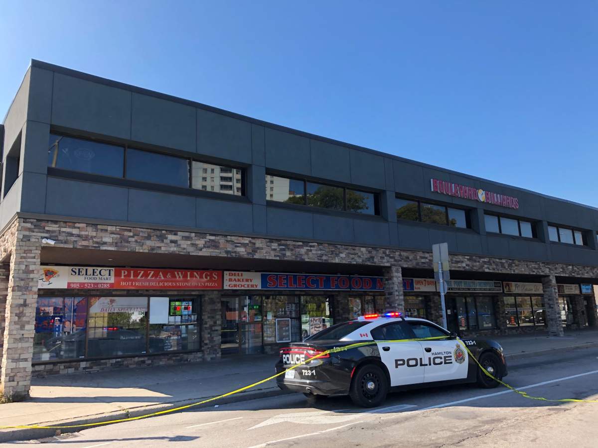 Hamilton police on scene after the city's 10th homicide at a Billiards club on York Street. The victim was shot dead on scene.