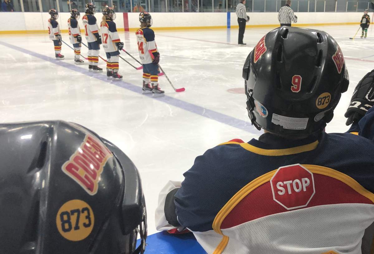 Mount Brydges minor hockey players showing support with their "Tyler 873" stickers.