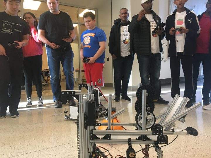 Quentin Norris, a Métis Cree student from Calgary, does a robotics demonstration with his team at Telus Spark on Sunday, Oct. 20, 2019.