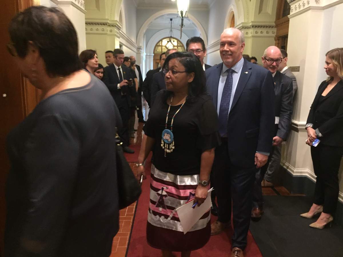 Premier John Horgan enters the B.C. Legislative chamber before his government introduced UNDRIP legislation.