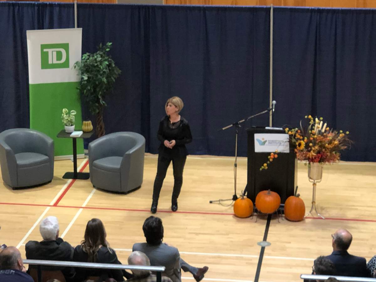 Tima Kurdi speaks to a crowd at NBCC St. Andrews