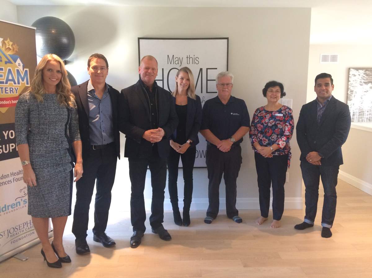 L-R: Sue and Doug Wastell (Wastell Homes, home builder), Mike and Sherry Holmes, Ron Mikula (LHSC), Sara Steers (Child's Health Foundation), Alfonso Campos Reales .
