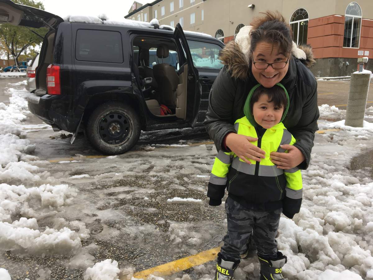 Jessica Swan and her son travelled to Winnipeg to stay in a hotel instead of coping without power at home.