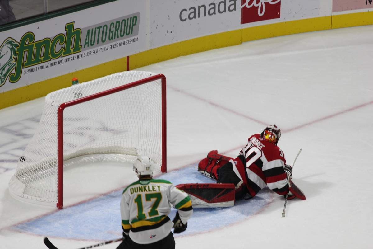 London, Ont. - Nathan Dunkley of the London Knights watches as a Connor McMichael shot finds the back of the net behind Ottawa 67's goalie Cedrick Andree in a 3-0 Knights win at Budweiser Gardens on October 4, 2019.