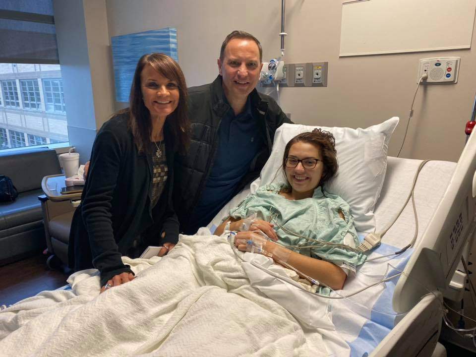 Jenna Schardt, right, is shown with her parents after her brain surgery at Methodist Dallas Medical Center on Oct. 29, 2019.